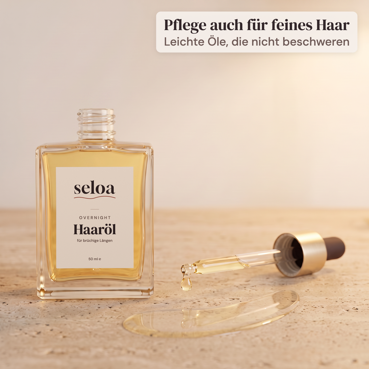Seloa Overnight Haaröl mit Pipette und leichter Öltextur auf Travertin